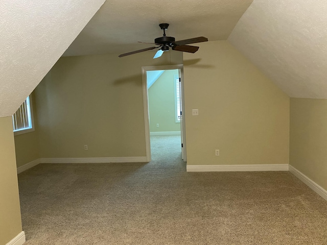 2114 E Finch St, Ozark, MO 65721 - additional living space featuring a textured ceiling, ceiling fan, carpet, and vaulted ceiling