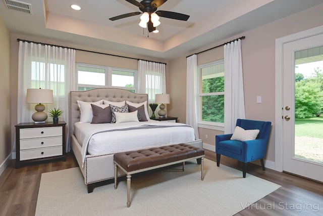 1851 N Patterson Ave, Springfield, MO 65803 - bedroom featuring a raised ceiling, wood finished floors, recessed lighting, ceiling fan, and access to exterior