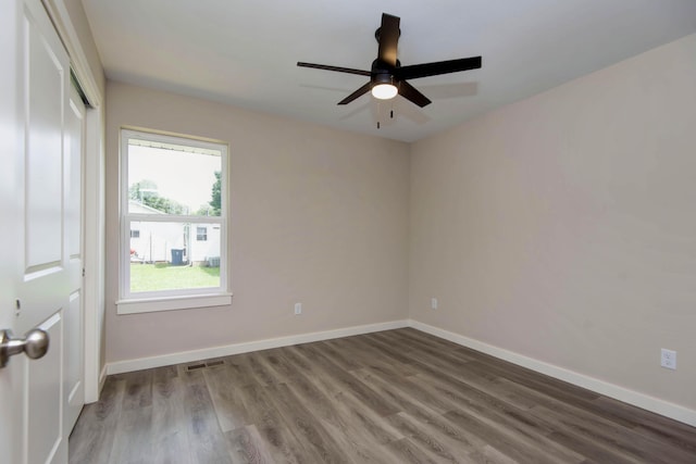 1851 N Patterson Ave, Springfield, MO 65803 - spare room with wood finished floors and a ceiling fan