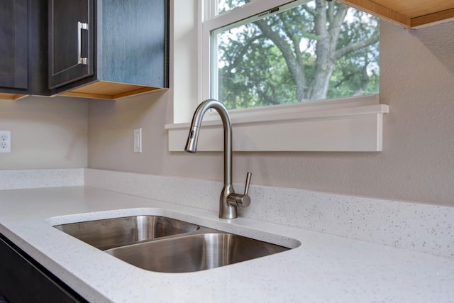 1851 N Patterson Ave, Springfield, MO 65803 - kitchen view of a sink and light stone counters