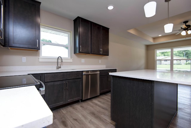 1851 N Patterson Ave, Springfield, MO 65803 - kitchen with stainless steel dishwasher, light wood finished floors, ceiling fan, recessed lighting, and range with electric stovetop