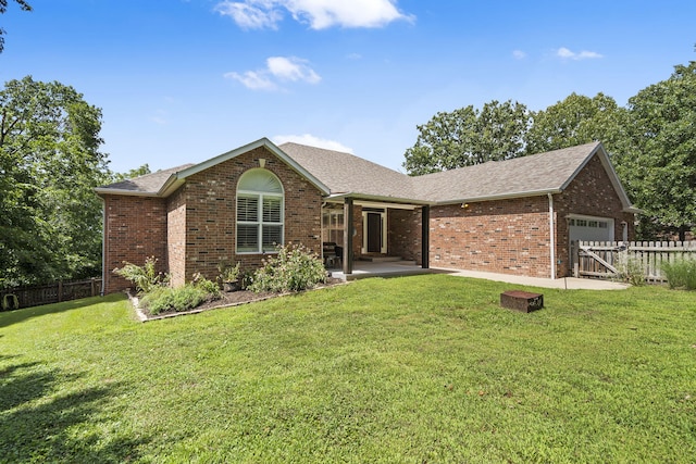 169 Tanner Rd, Branson, MO 65616 - view of front facade featuring a garage, brick siding, and a shingled roof