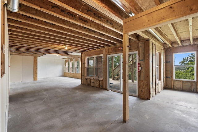 169 Tanner Rd, Branson, MO 65616 - miscellaneous room featuring healthy amount of natural light and unfinished concrete floors