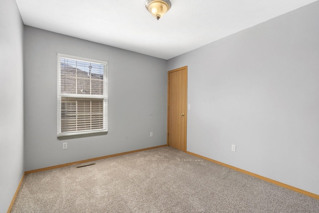 421 W White Ash Rd, Nixa, MO 65714 - empty room with carpet flooring and baseboards