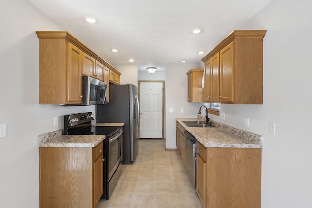 421 W White Ash Rd, Nixa, MO 65714 - kitchen featuring appliances with stainless steel finishes, brown cabinetry, light countertops, and recessed lighting