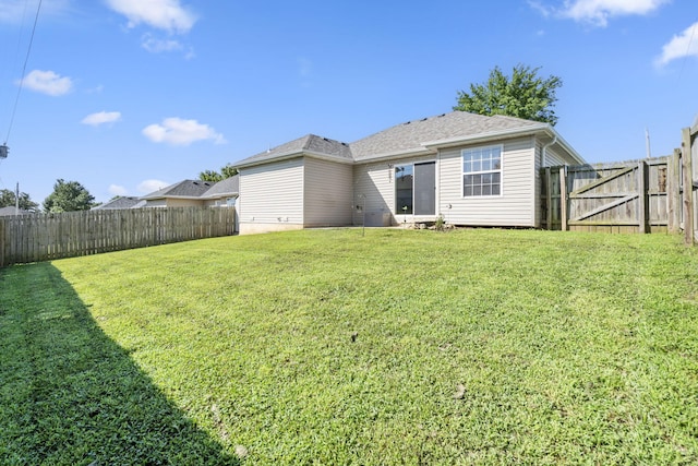 421 W White Ash Rd, Nixa, MO 65714 - back of property featuring a fenced backyard