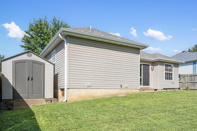 421 W White Ash Rd, Nixa, MO 65714 - rear view of house with entry steps and a shed
