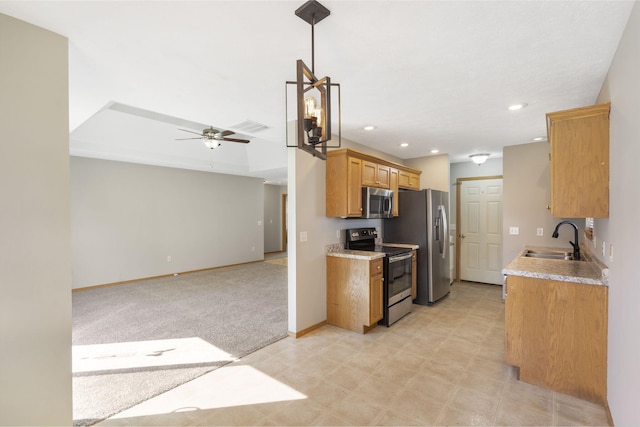 421 W White Ash Rd, Nixa, MO 65714 - kitchen featuring appliances with stainless steel finishes, open floor plan, a ceiling fan, light countertops, and recessed lighting