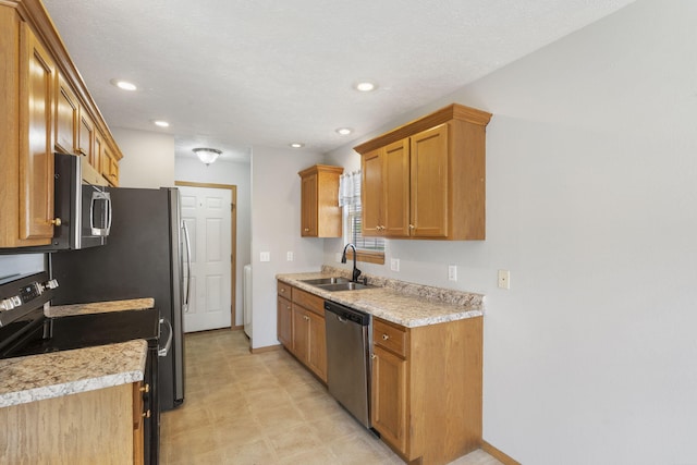 421 W White Ash Rd, Nixa, MO 65714 - kitchen featuring stainless steel appliances, light countertops, recessed lighting, and brown cabinetry