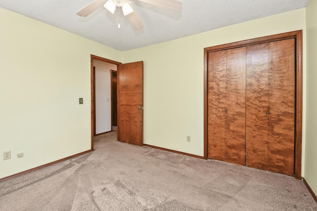 3642 N Olive Ct, Springfield, MO 65803 - unfurnished bedroom featuring carpet, ceiling fan, and a textured ceiling