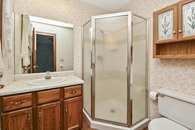 3642 N Olive Ct, Springfield, MO 65803 - full bathroom featuring wallpapered walls, vanity, and a shower stall