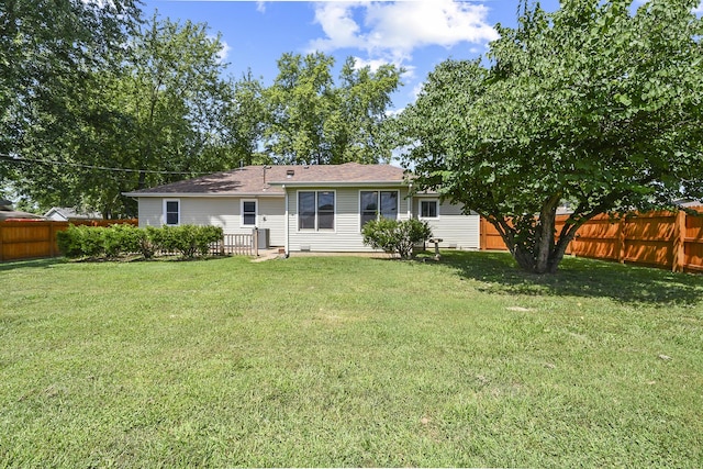 3642 N Olive Ct, Springfield, MO 65803 - rear view of house with a fenced backyard