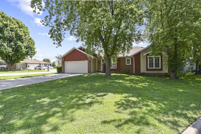 3642 N Olive Ct, Springfield, MO 65803 - view of front of house with driveway, an attached garage, a front lawn, and brick siding