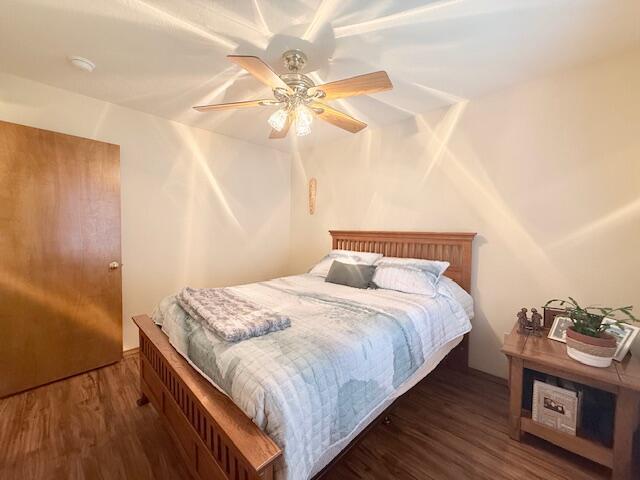 3086 S Suburban Ave, Springfield, MO 65807 - bedroom featuring wood finished floors and ceiling fan