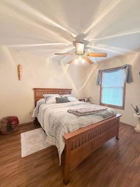 3086 S Suburban Ave, Springfield, MO 65807 - bedroom featuring wood finished floors and ceiling fan