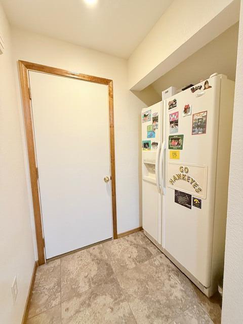 3086 S Suburban Ave, Springfield, MO 65807 - kitchen featuring white refrigerator with ice dispenser