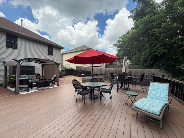 3086 S Suburban Ave, Springfield, MO 65807 - deck featuring outdoor dining space, outdoor lounge area, a pergola, and a fenced backyard