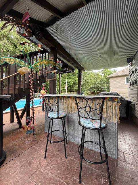3086 S Suburban Ave, Springfield, MO 65807 - view of patio / terrace featuring an outdoor pool