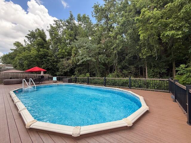 3086 S Suburban Ave, Springfield, MO 65807 - view of swimming pool featuring a wooden deck