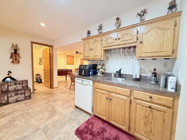 3086 S Suburban Ave, Springfield, MO 65807 - kitchen featuring white dishwasher, light brown cabinets, and dark countertops