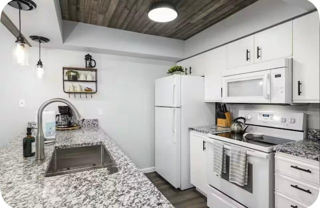200 Golfview Dr Unit D5, Branson, MO 65616 - kitchen with white appliances, light stone counters, white cabinetry, and wood ceiling