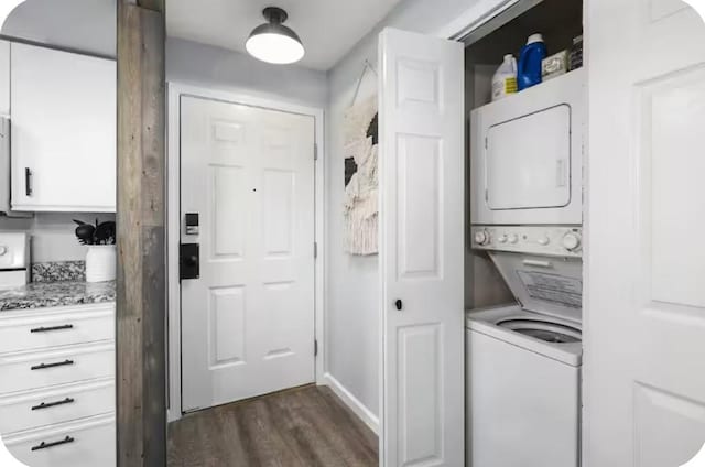 200 Golfview Dr Unit D5, Branson, MO 65616 - laundry area with stacked washer / drying machine and dark wood-style flooring