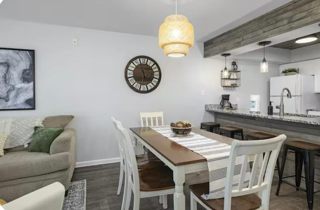 200 Golfview Dr Unit D5, Branson, MO 65616 - dining room featuring beamed ceiling and wood finished floors