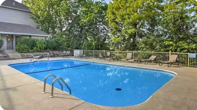 200 Golfview Dr Unit D5, Branson, MO 65616 - community pool featuring view of scattered trees and a patio area