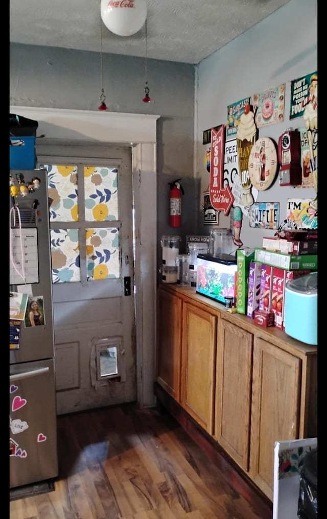 1885 N Lyon Ave, Springfield, MO 65803 - doorway to outside featuring light wood-type flooring