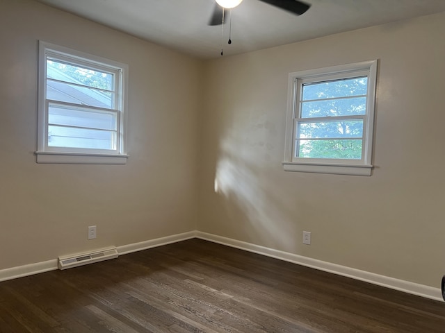 1846 S Nettleton Ave, Springfield, MO 65807 - empty room featuring plenty of natural light, dark wood-style floors, and ceiling fan