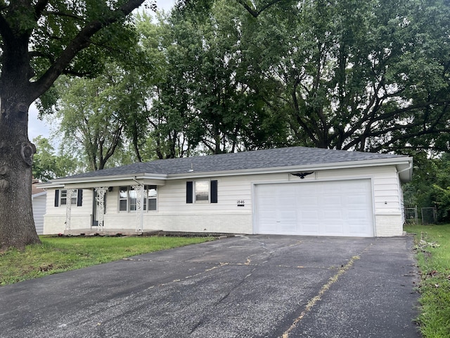 1846 S Nettleton Ave, Springfield, MO 65807 - ranch-style home featuring driveway, a garage, and brick siding