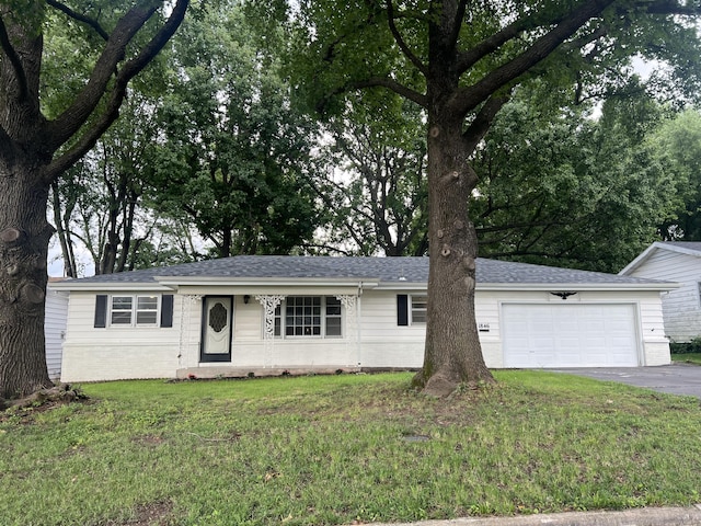 1846 S Nettleton Ave, Springfield, MO 65807 - ranch-style home with driveway, a front yard, a garage, and roof with shingles