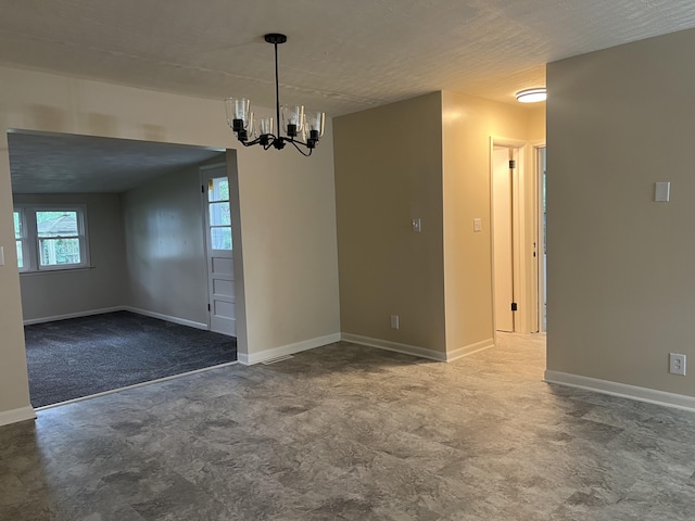 1846 S Nettleton Ave, Springfield, MO 65807 - unfurnished room with a chandelier and baseboards