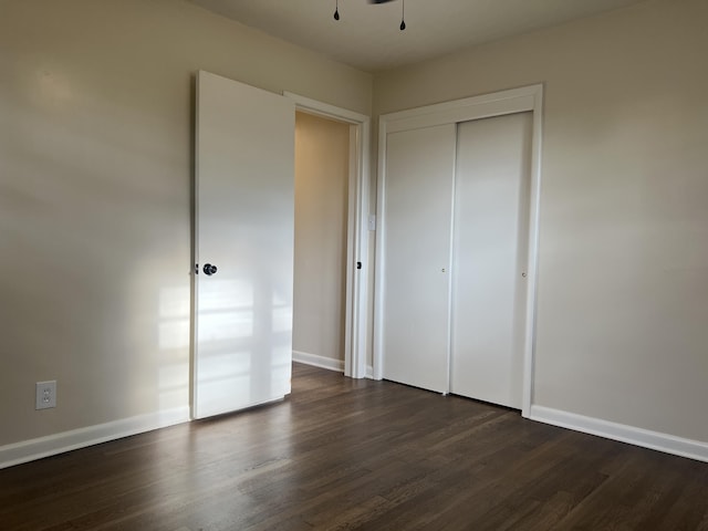 1846 S Nettleton Ave, Springfield, MO 65807 - unfurnished bedroom with dark wood-style floors and a closet