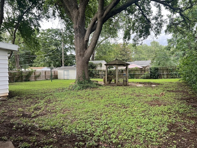 1846 S Nettleton Ave, Springfield, MO 65807 - fenced backyard featuring a storage shed
