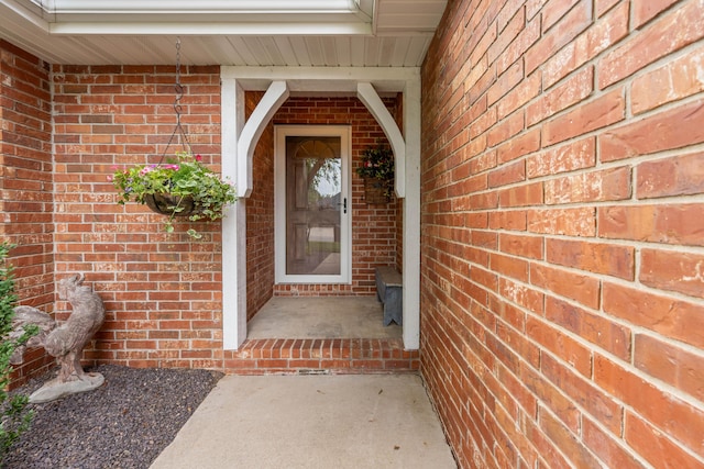 1021 W Whiteside St, Springfield, MO 65807 - doorway to property with brick siding