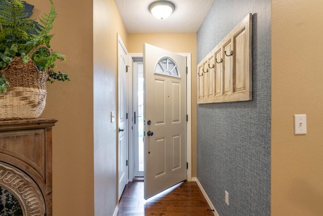 1021 W Whiteside St, Springfield, MO 65807 - entryway with dark wood-type flooring and baseboards