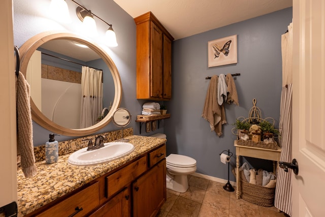 1021 W Whiteside St, Springfield, MO 65807 - bathroom featuring vanity and toilet