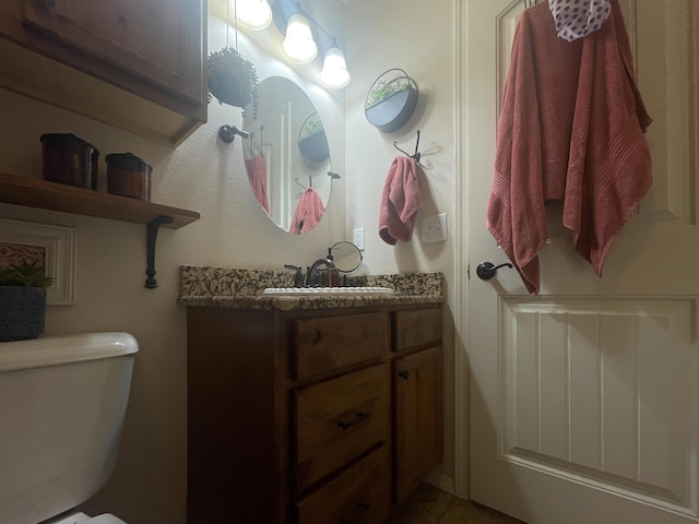 1021 W Whiteside St, Springfield, MO 65807 - half bathroom with vanity and toilet