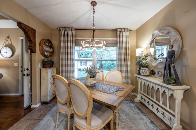 1021 W Whiteside St, Springfield, MO 65807 - dining area with a chandelier and baseboards