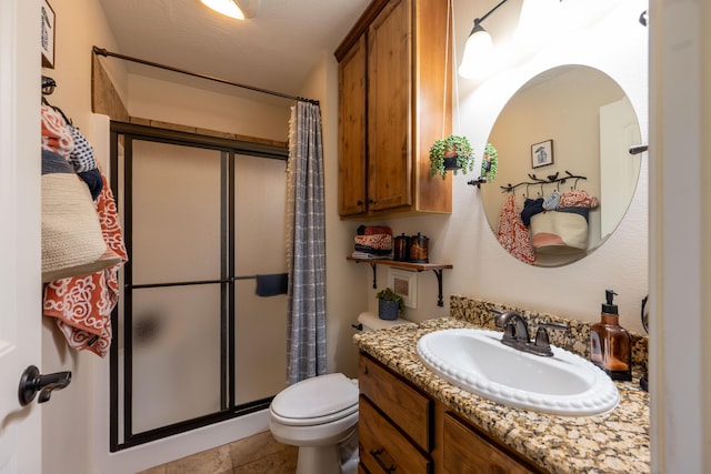 1021 W Whiteside St, Springfield, MO 65807 - bathroom featuring a shower stall and vanity