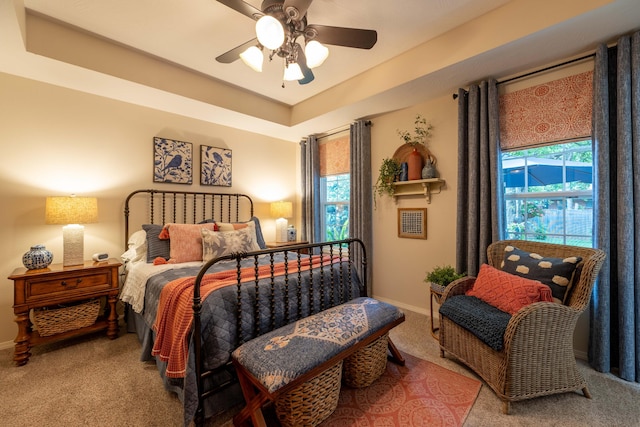 1021 W Whiteside St, Springfield, MO 65807 - carpeted bedroom with baseboards and a ceiling fan