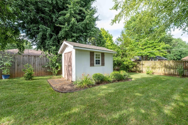 1021 W Whiteside St, Springfield, MO 65807 - view of shed with a fenced backyard