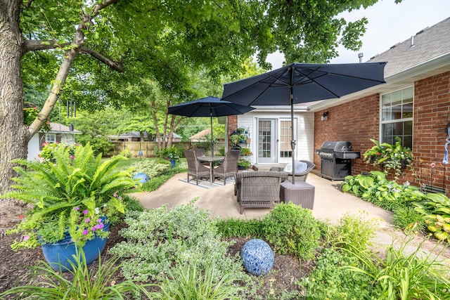 1021 W Whiteside St, Springfield, MO 65807 - view of patio with grilling area and french doors