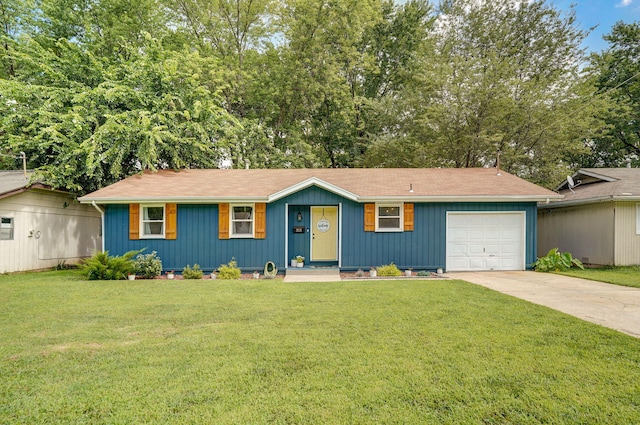 303 E Berkeley St, Springfield, MO 65807 - ranch-style home featuring concrete driveway, a front yard, an attached garage, and a shingled roof