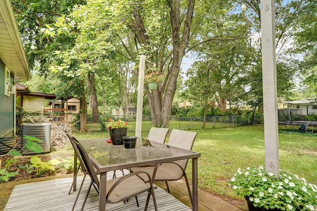 303 E Berkeley St, Springfield, MO 65807 - deck featuring a fenced backyard and outdoor dining area