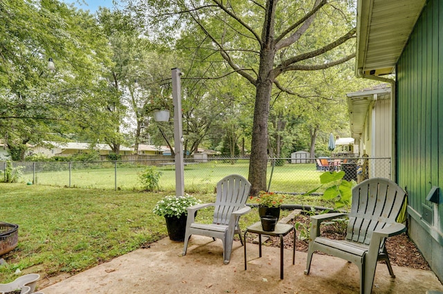 303 E Berkeley St, Springfield, MO 65807 - fenced backyard with a patio area
