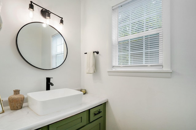 303 E Berkeley St, Springfield, MO 65807 - bathroom with plenty of natural light and vanity