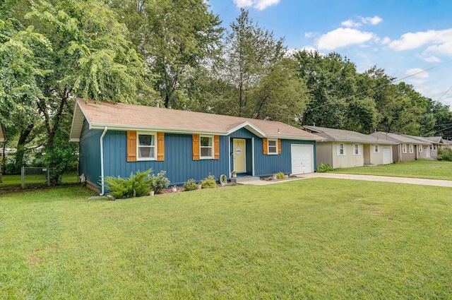 303 E Berkeley St, Springfield, MO 65807 - ranch-style house with concrete driveway and a garage