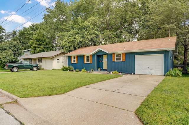 303 E Berkeley St, Springfield, MO 65807 - ranch-style home featuring a front lawn, driveway, a garage, a shingled roof, and board and batten siding